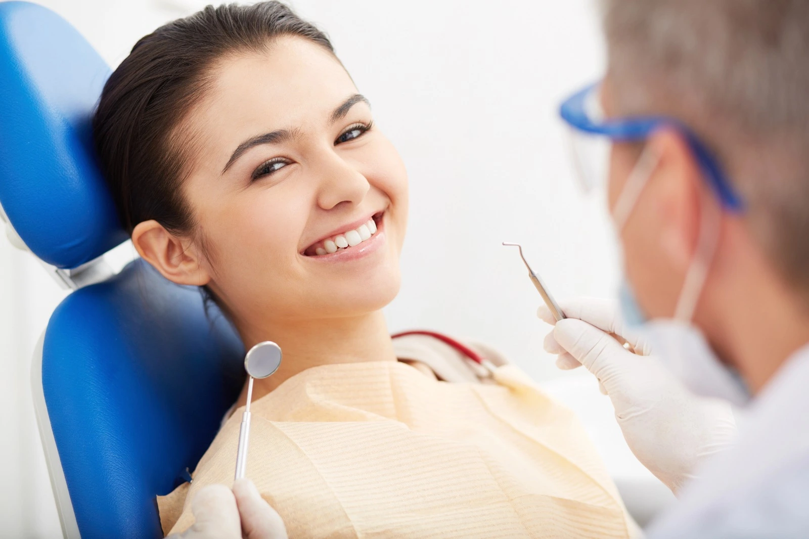 Girl-on-dentist-chair-smiling